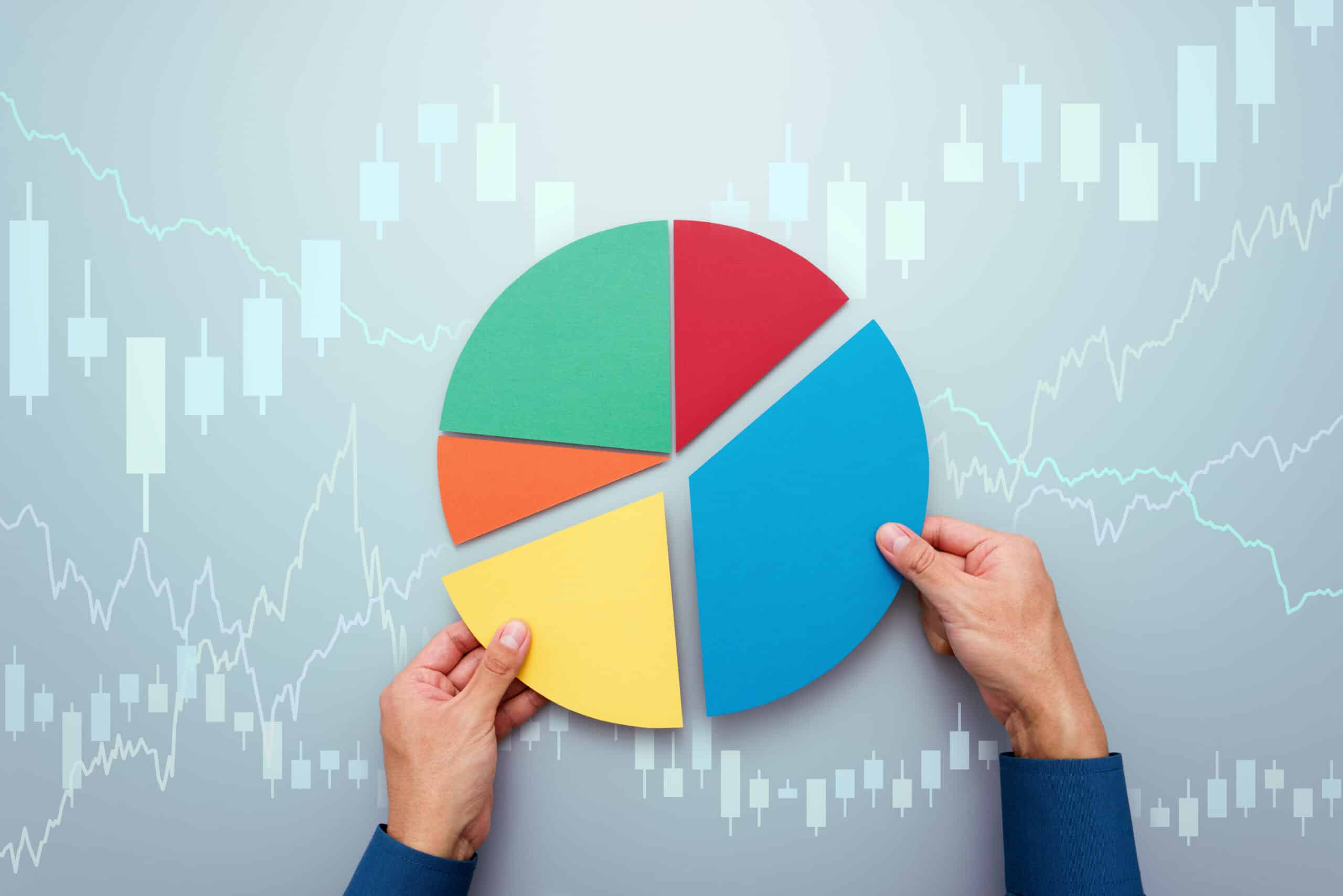 Hands dividing pie chart